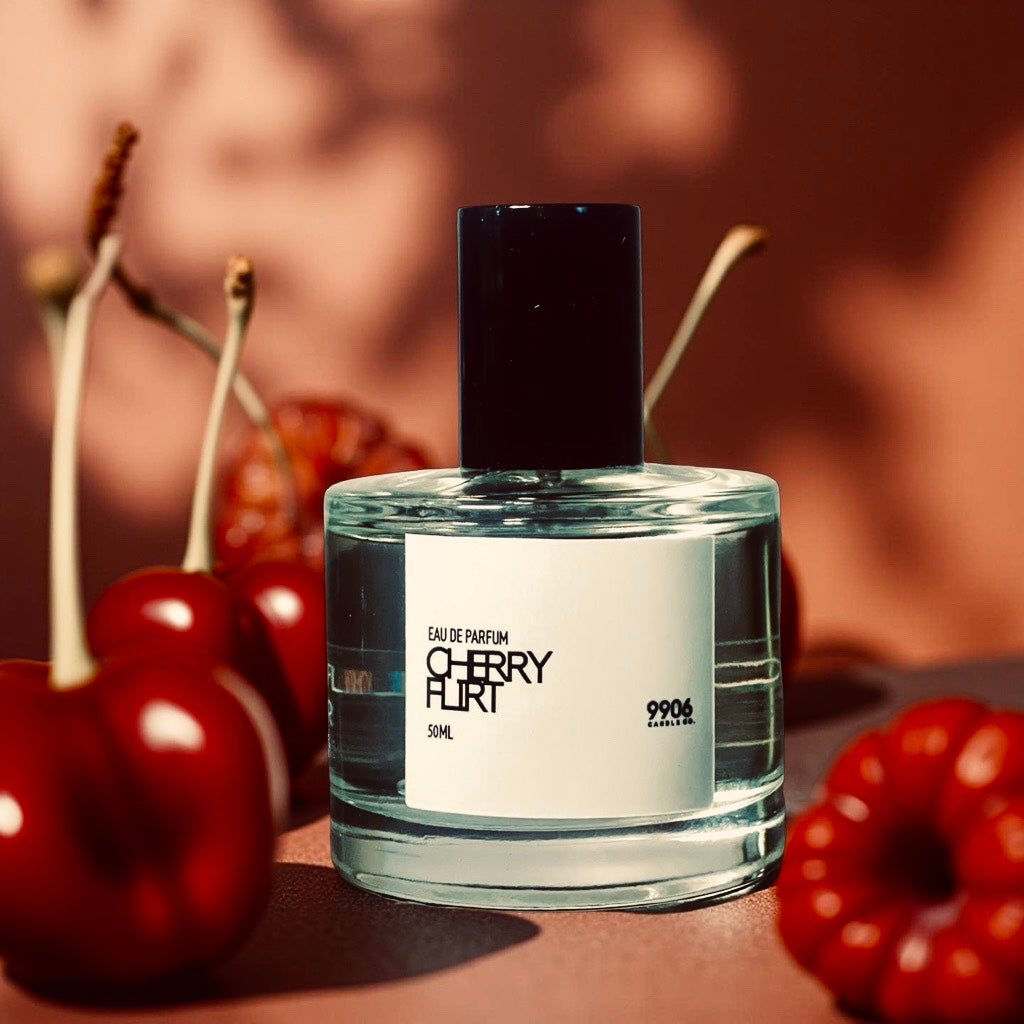 Cherry Flirt perfume with a fruity and woody scent profile, featuring amber and vanilla notes.
