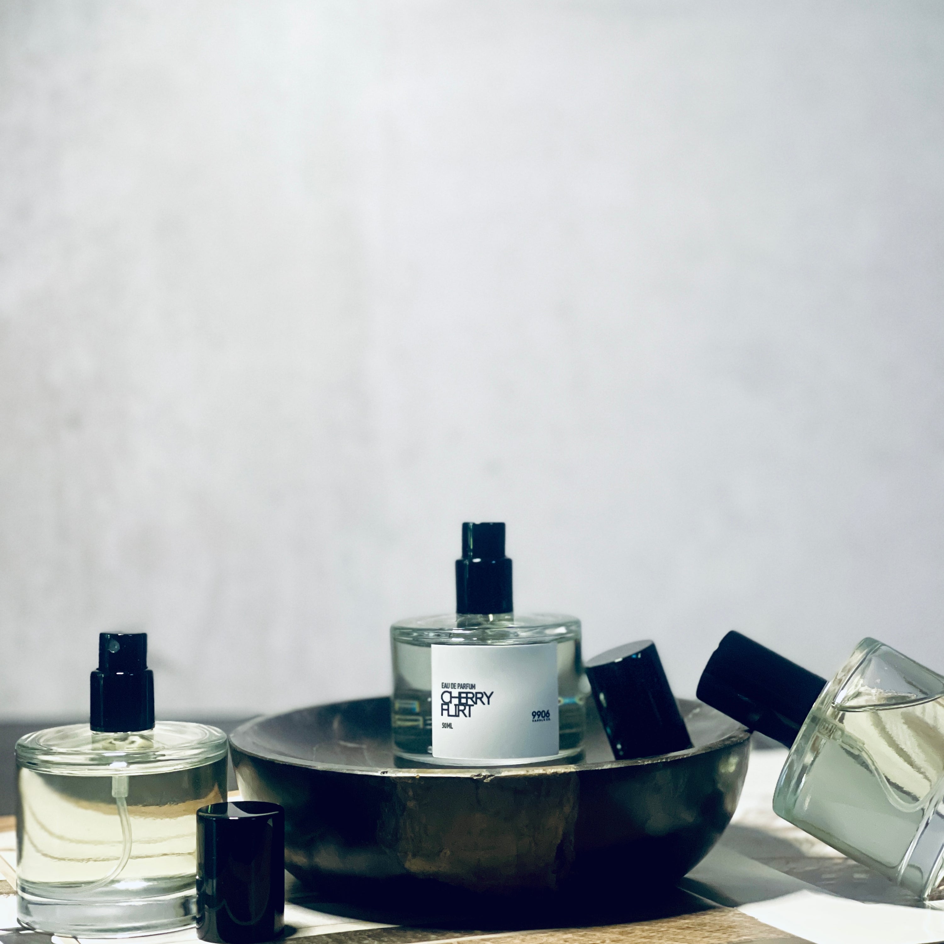 Cherry Flirt perfume with a fruity and woody scent profile, featuring amber and vanilla notes.