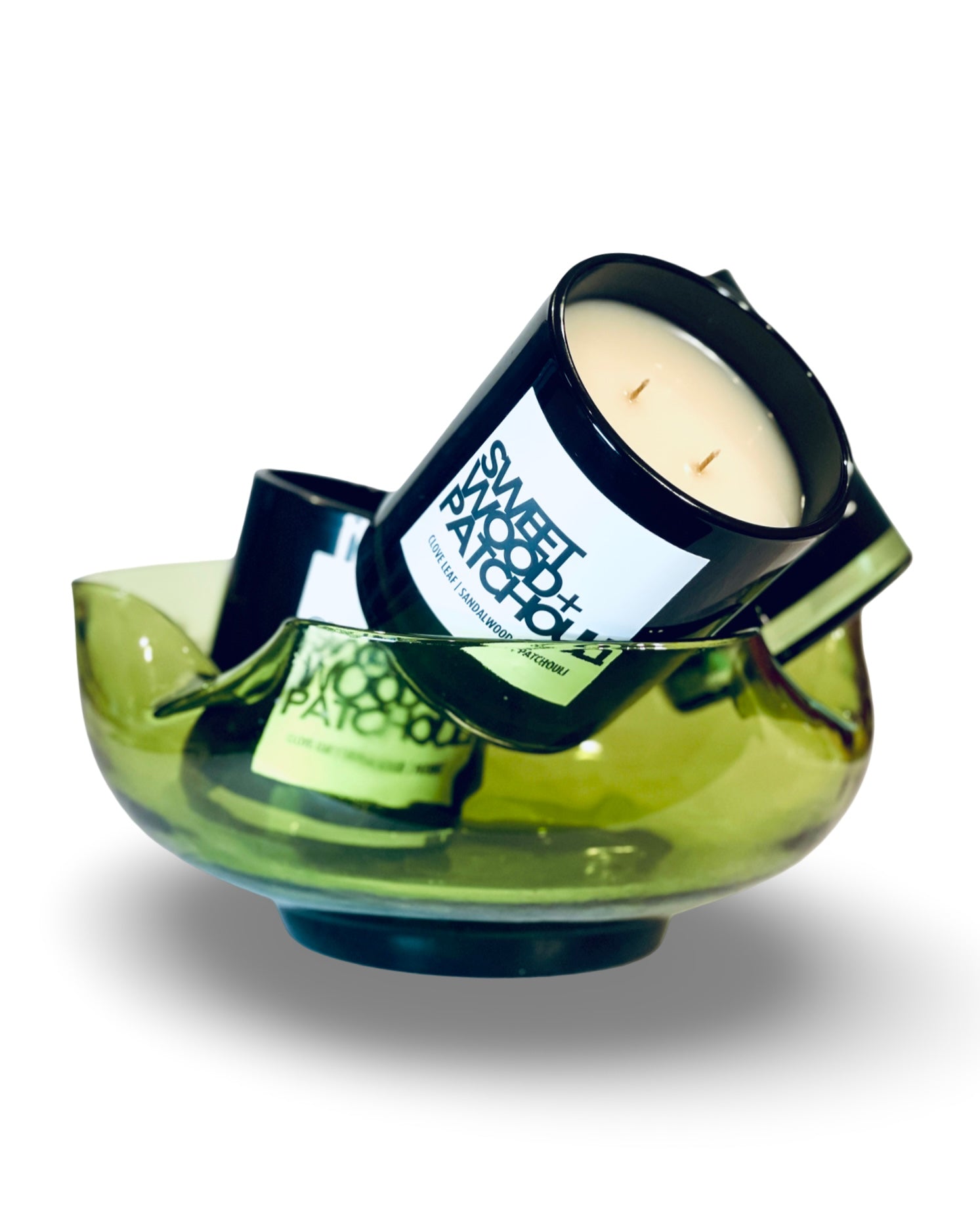 Sweet Wood + Patchouli candle in glossy black tumbler